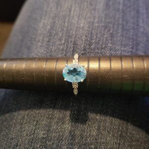 Blue topaz, diamond and white gold ring